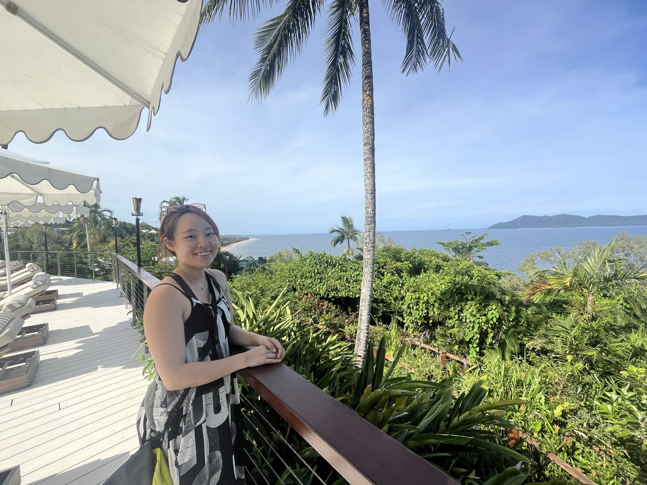Sayaka Mochida on a deck above the Cairns coast